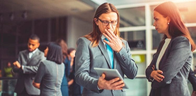 people looking at tablet